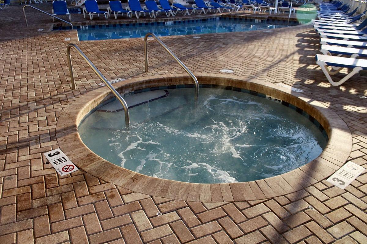 A hot tub near the Lazy River of the Avista Resort