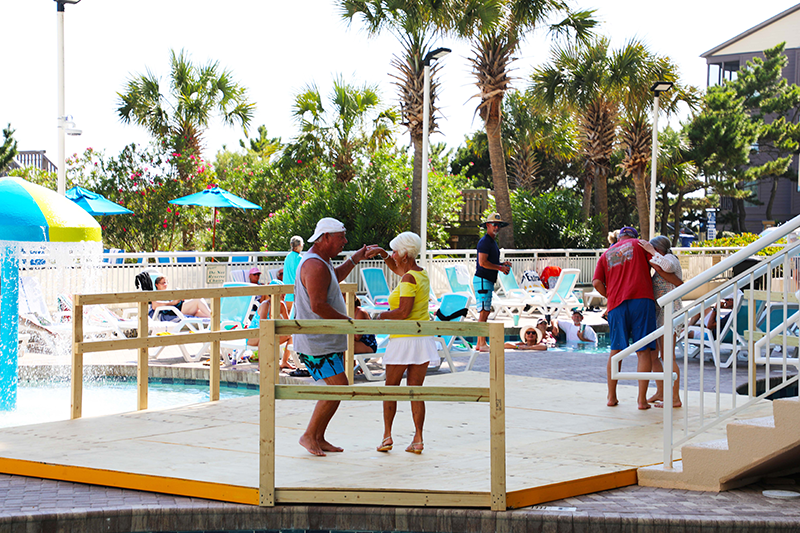 Couples seen doing the shag poolside at Avista Resort.
