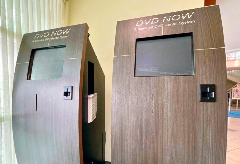 Two wooden DVD Now Unlimited DVD Rental Machines in the lobby of Avista Resort